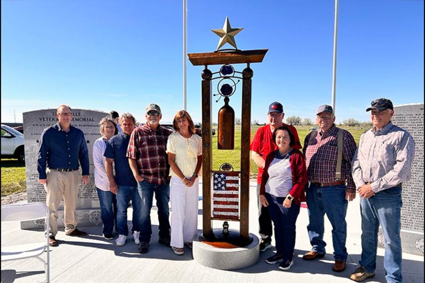 Lewisville Veterans Foundation committee poses for a photo in front of the new monument Saturday morning. | Rett Nelson, EastIdahoNews.com