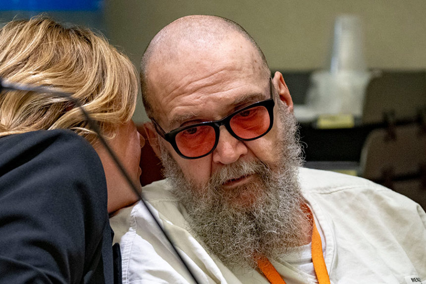 Jasmine North, Federal Public Defender Mitigation Investigator, speaks with Ralph Leroy Menzies, during his competency hearing in Third District Court in West Jordan, on Monday, Nov 18, 2024. (Rick Egan//The Salt Lake Tribune via AP, Pool)