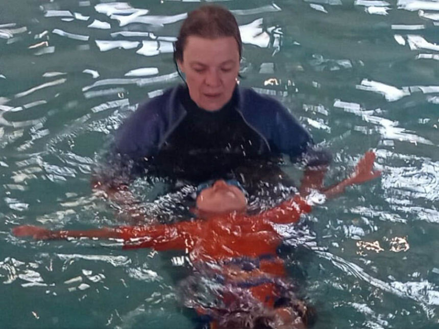 Paige Armstrong teaching in pool