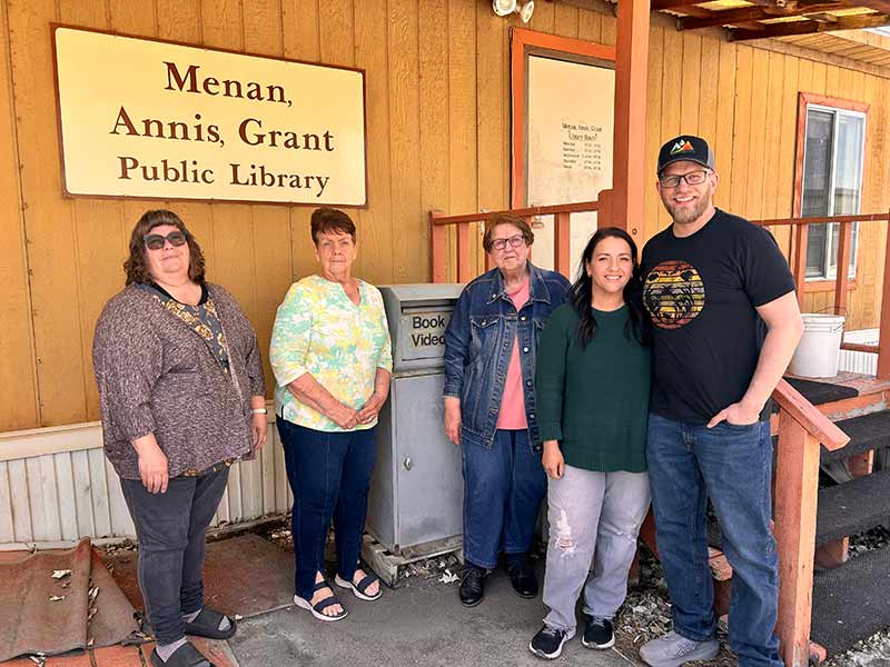 James and Megan Zolman, right, with Jefferson County Library District trustees Laurie Willmore, left, JoAnn Jones, second from left, and Linda Radford. | Rett Nelson, EastIdahoNews.com