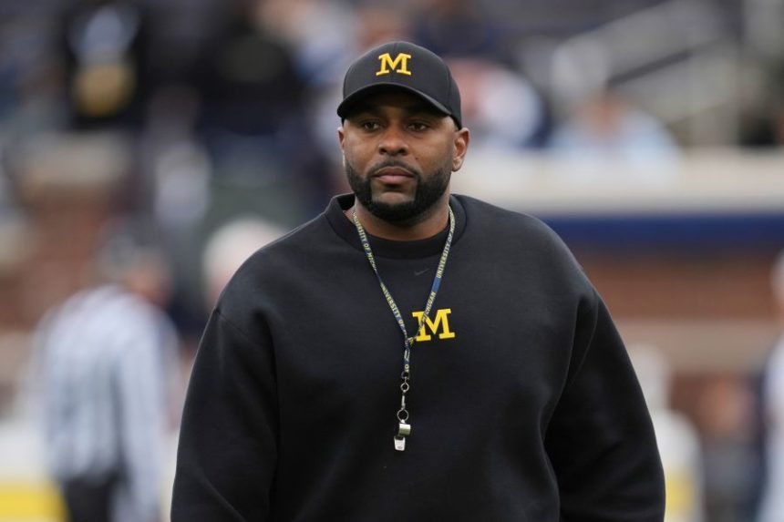 michigan coach suspended