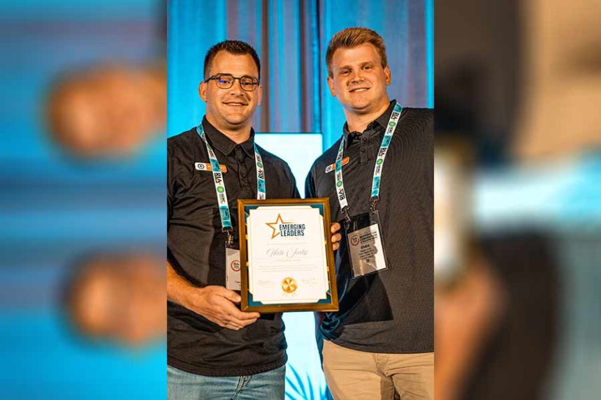 Nate Judy, left, with his brother, Blake. Nate was recognized as one of the restoration industry's top 5 emerging leaders under 40 at an awards convention in Florida last week. | Courtesy Nate Judy
