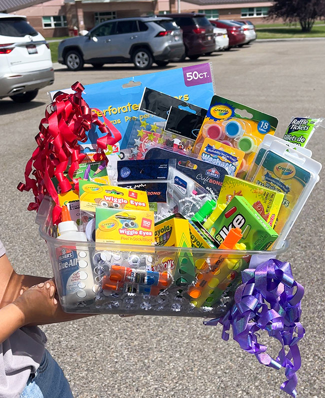 A box of donated school supplies. | Courtesy Kelsey Hess