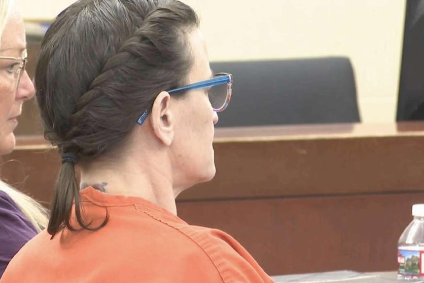 Nichole Scott, stepmother of a 12-year-old West Haven boy who died of sepsis in 2024 after years of abuse and neglect, listens to a judge Monday as she is ordered to spend at least 20 years and up to life in prison after pleading guilty to the boy's murder. (Greg Anderson, KSL-TV)