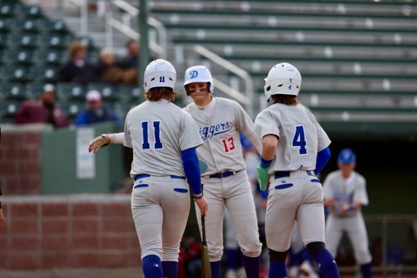 Sugar-Salem's Ben Aldrich (11), Hank Carter (13) and Sam Chappell celebrate during Friday's game against Marsh Valley. | Courtesy photo.