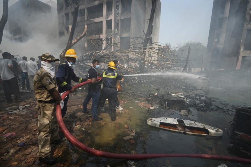 Firefighters work at the site of an airplane that crashed in India's northwestern city of Ahmedabad in Gujarat state, Thursday, June 12, 2025. | Ajit Solanki, Associated Press