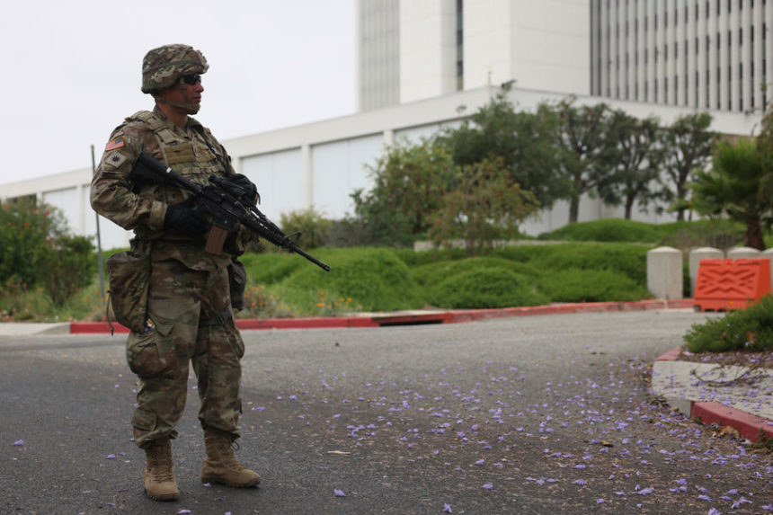 A member of the National Guard stands outside the Wishire Federal building on Thursday, June 12, 2025. | Etienne Laurent, EastIdahoNews.com