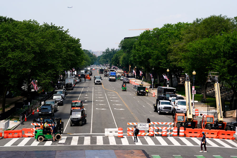 Preparations continue on Constitution Avenue ahead of an upcoming military parade commemorating the U.S. Army's 250th anniversary that coincides with President Donald Trump's 79th birthday, Friday, June 13, 2025, in Washington (AP Photo/Julia Demaree Nikhinson)