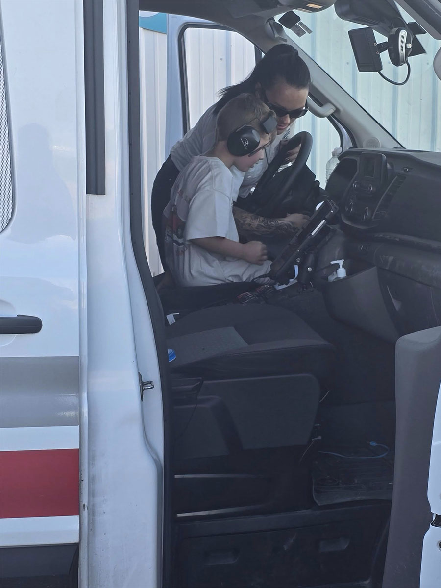 Brennan Havens inside the Acute Rescue vehicle.