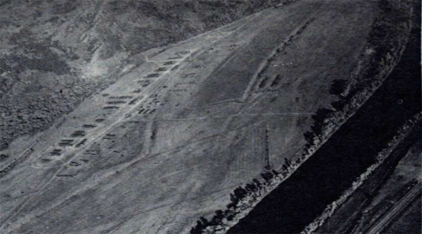 Camp Palisades where Rigby National Guardsmen are spending two-weeks in field training for the Idaho National Guard. Camp Palisades, located on the south side of the Snake River, across from the Bureau of Reclamation townsite, enjoyed many of the modern conveniences -- electric lights and showers were included. Caption dated June 16, 1960.