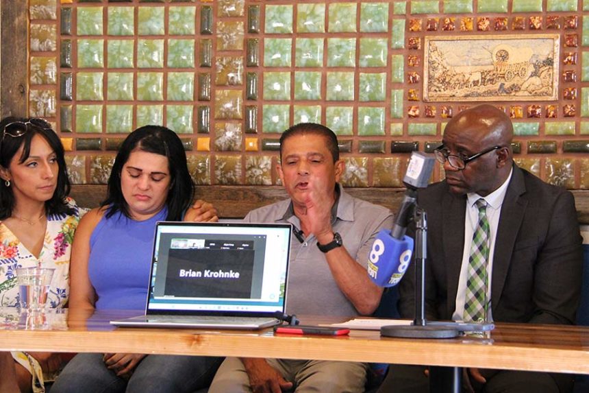 Luis Alicea speaks at a press conference