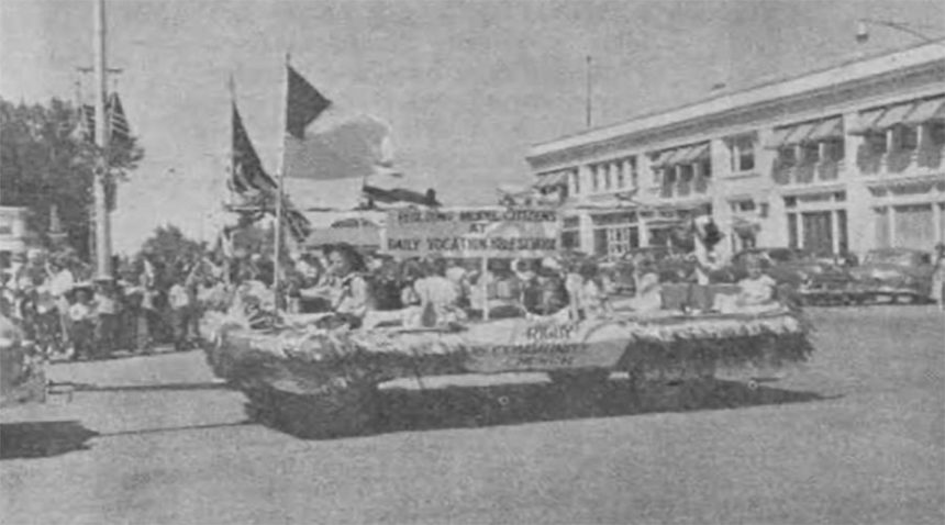 Second place parade winner in "Church Group" (was the) Rigby Community Church float on building model citizens. Caption dated June 21, 1951.