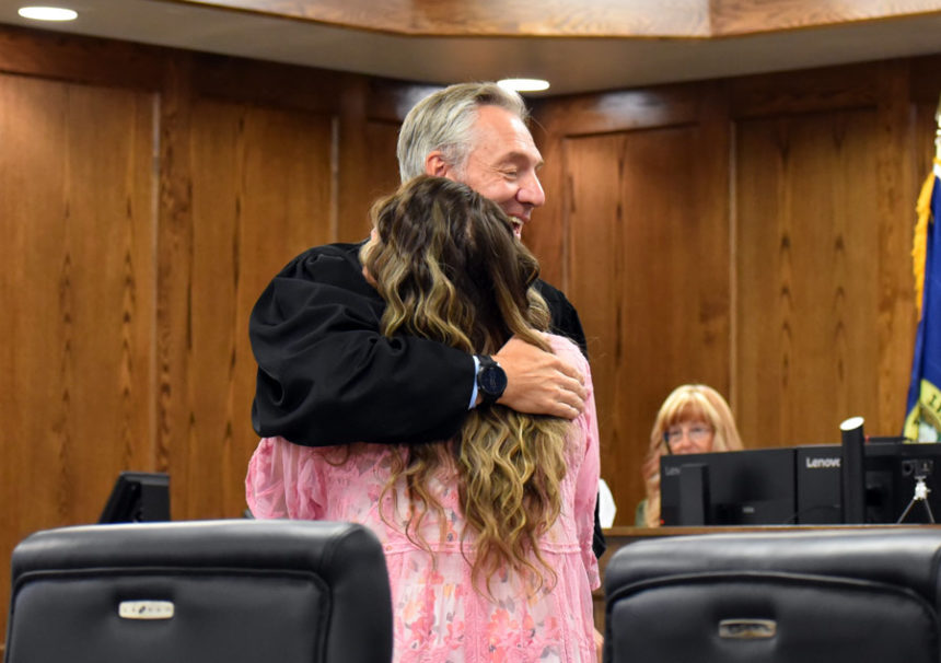District Judge Dane Watkins Jr. congratulates Sarah Cartier on her graduation from Wood Court. | Kaitlyn Hart, EastIdahoNews.com