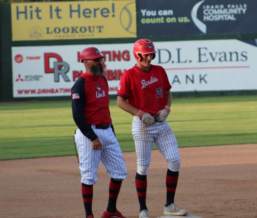 Bandits runner Makai Ferguson talks to coach Ryan Alexander during a game against Pocatello. | Allan Steele, EastIdahoSports.com