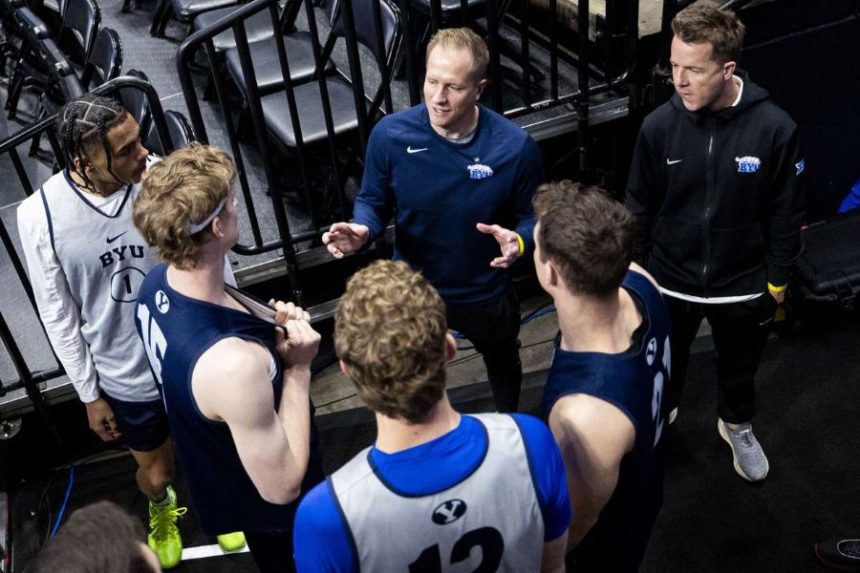 BYU Cougars head coach Kevin Young talks with his players before a practice held at Ball Arena in Denver, Colo., on Wednesday, March 19, 2025. (Photo: Isaac Hale, Deseret News)