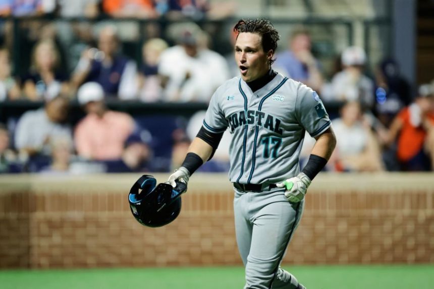 FILE - Coastal Carolina's Caden Bodine (17) celebrates hitting a solo home run during an NCAA super regional college baseball game against Auburn, Friday, June 6, 2025 in Auburn, Ala. (AP Photo/Stew Milne, File)