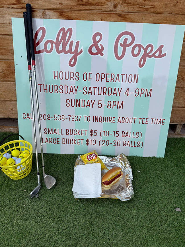 Food vendor and floating green prices | Courtesy Trent Tyler