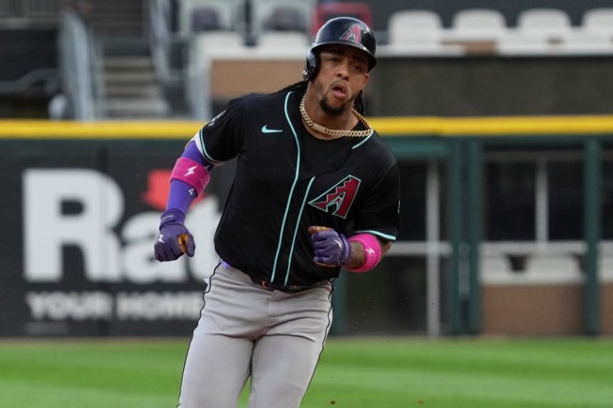 Arizona Diamondbacks' Ketel Marte rounds the bases after hitting a solo home run during the first inning of a baseball game against the Chicago White Sox in Chicago, Tuesday, June 24, 2025. (AP Photo/Nam Y. Huh)