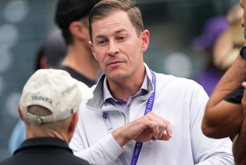 Walker Monfort, who was named as executive vice president of the Colorado Rockies Thursday, June 25, 2025, and will assume the role of president and chief operating officer at season's end, talks to fans before a baseball game Wednesday, June 25, 2025, in Denver. (AP Photo/David Zalubowski)