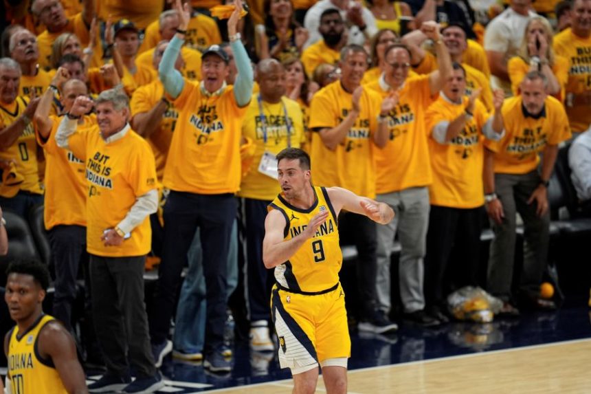 Indiana Pacers guard T.J. McConnell celebrates a basket against the Oklahoma City Thunder during the second half of Game 3 of the NBA Finals basketball series, Wednesday, June 11, 2025, in Indianapolis. (AP Photo/Abbie Parr)
