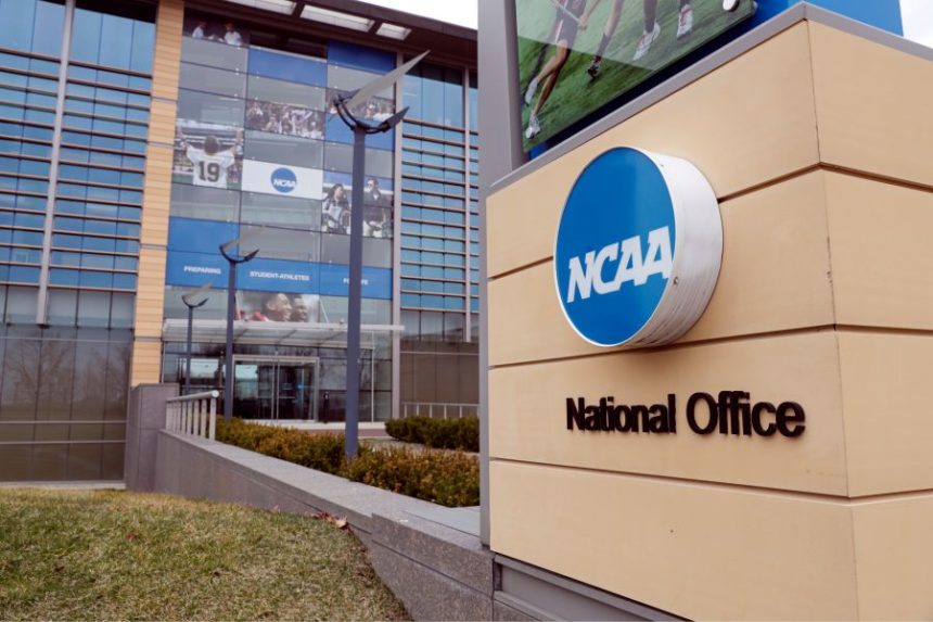 FILE - The national office of the NCAA in Indianapolis is shown on March 12, 2020. (AP Photo/Michael Conroy, File)