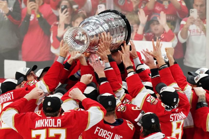 The Florida Panthers raise the Stanley Cup after defeating the Edmonton Oilers in Game 6 of the NHL hockey Stanley Cup Final in Sunrise, Fla., Tuesday, June 17, 2025. (Nathan Denette/The Canadian Press via AP)