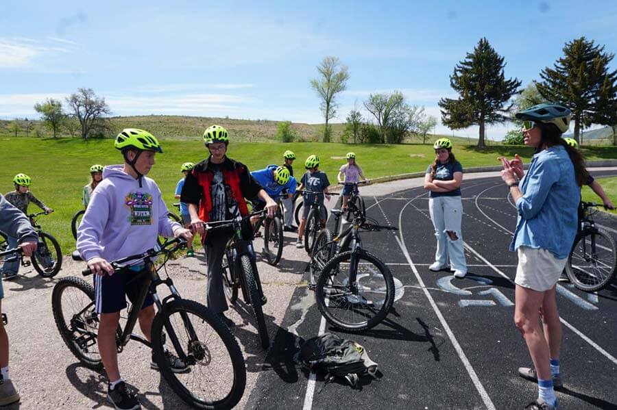 Teacher Christa Gessaman shares the plan for the day with her R4F students at Franklin Middle School