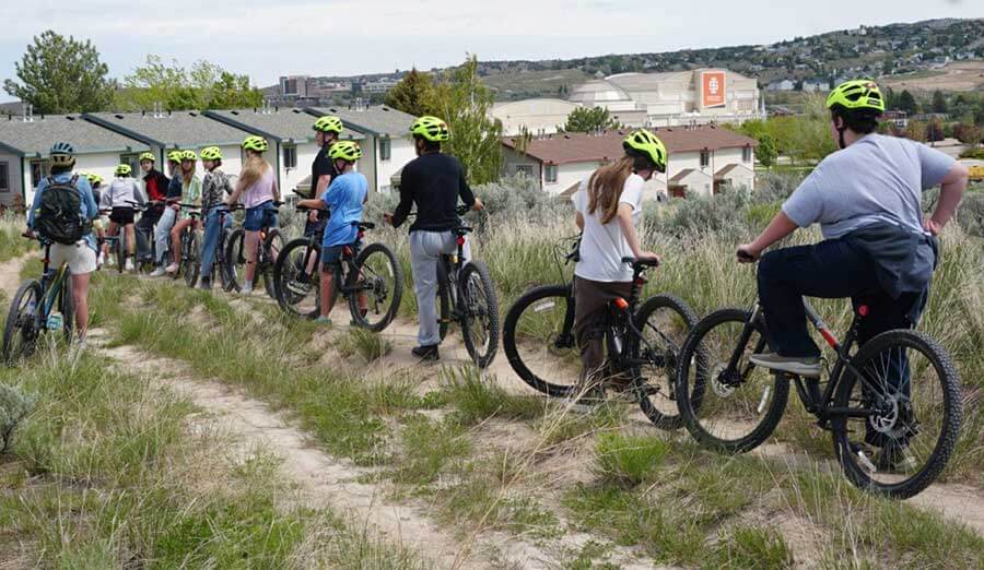 Franklin Middle School students riding their bikes during a R4F class