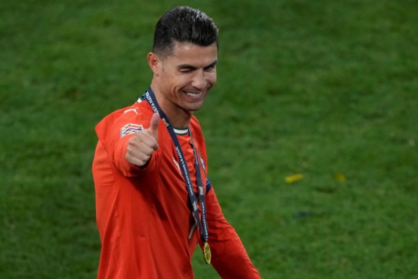 Portugal's Cristiano Ronaldo celebrates after winning the Nations League soccer championship at the Allianz Arena in Munich, Germany, Sunday, June 8, 2025. (AP Photo/Michael Probst)