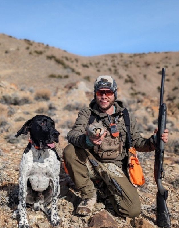Jake Schmitt is shown with his dog Buddy in this undated photo. Schmitt says the dog helped him keep going after a serious side-by-side crash in the Uintas on July 20. - Schmitt family