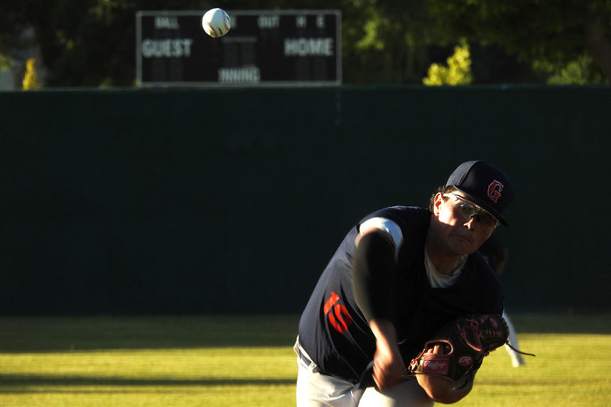Xavier McGhee pitches during a Grays loss to the Ogden Gunners.