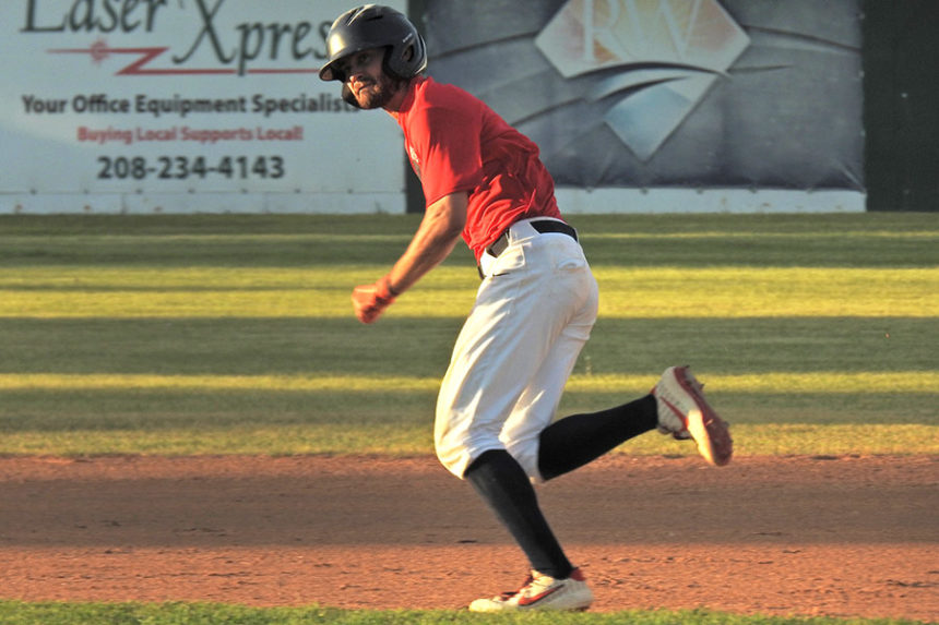 Grays outfielder Brody Burch steals a base.