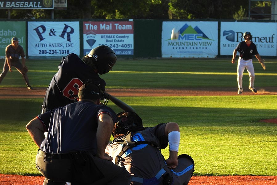 Tyler Vance hits a two-run triple to center during the Grays loss to the Ogden Gunners.