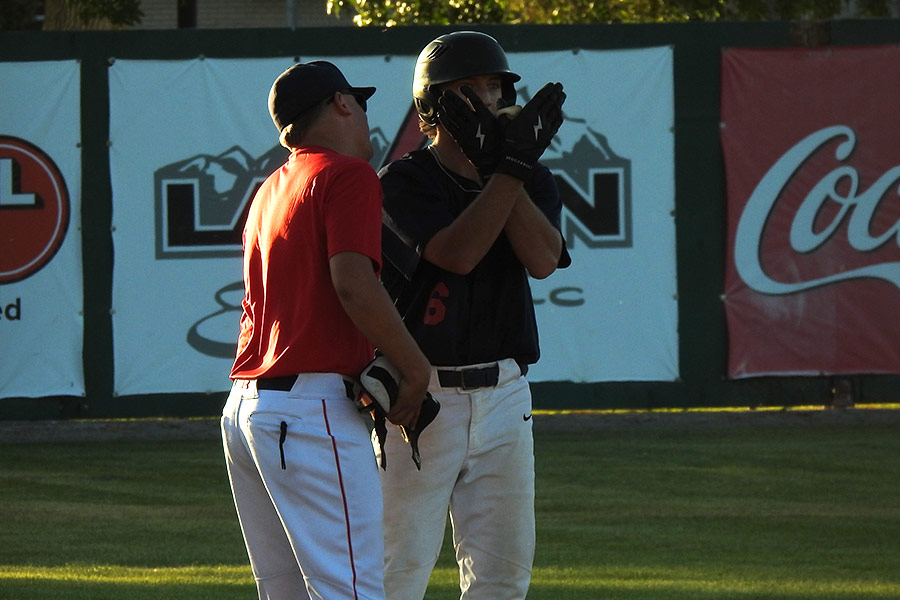 Tyler Vance celebrates a two-run triple