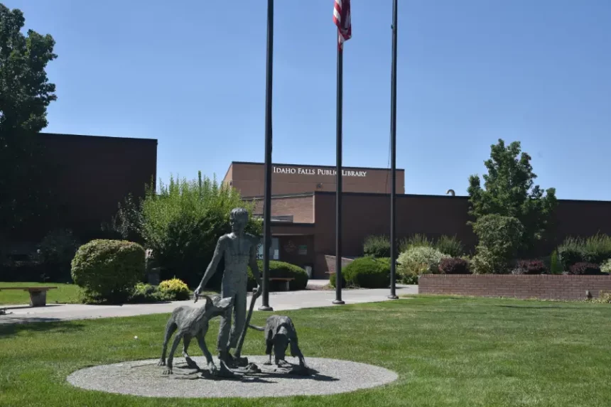 Idaho Falls Library Front Boy with Dogs Statue