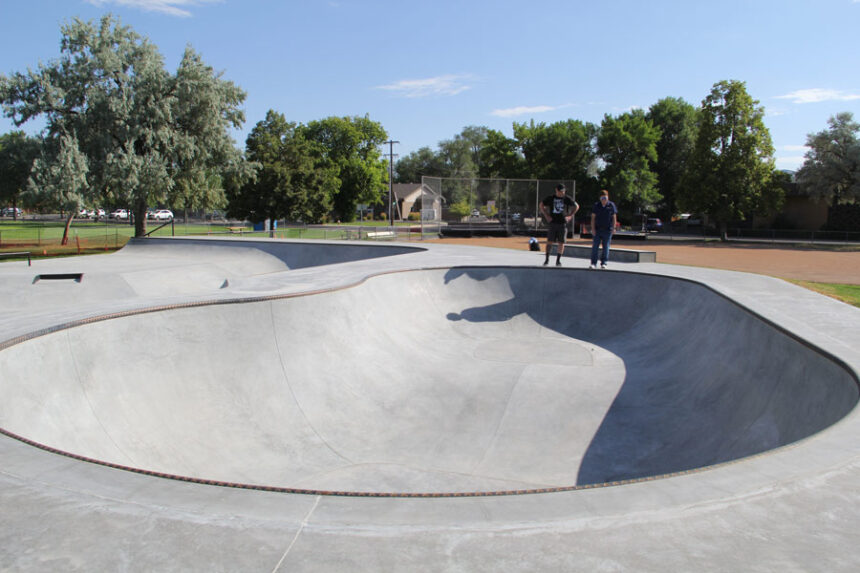 Van Etten and Butler look down into the skating bowl.