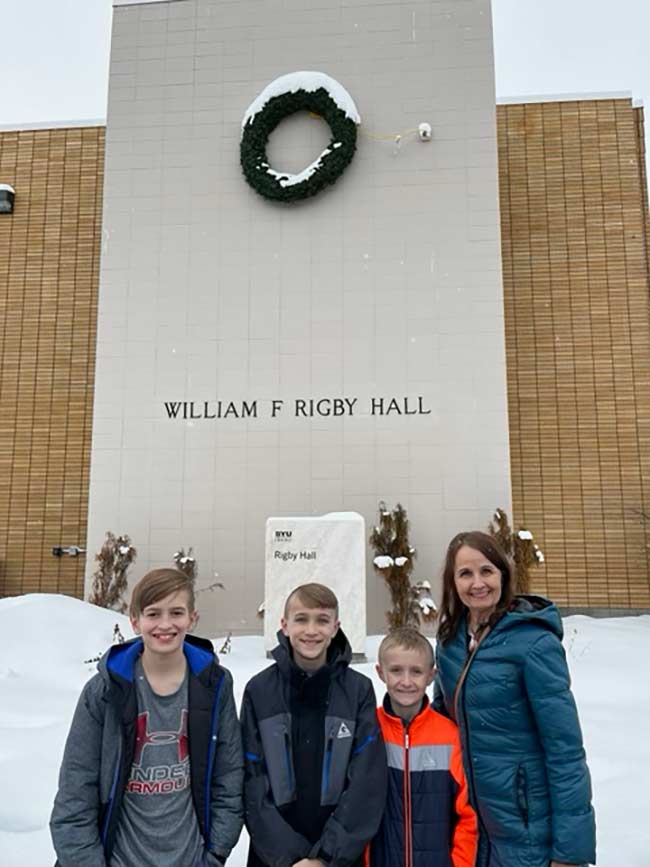 Beverly Boyle, right, is William Rigby's great-great-granddaughter. This photo shows her with her grandkids in front of the William F. Rigby Hall in Rexburg. | Courtesy Beverly Boyle