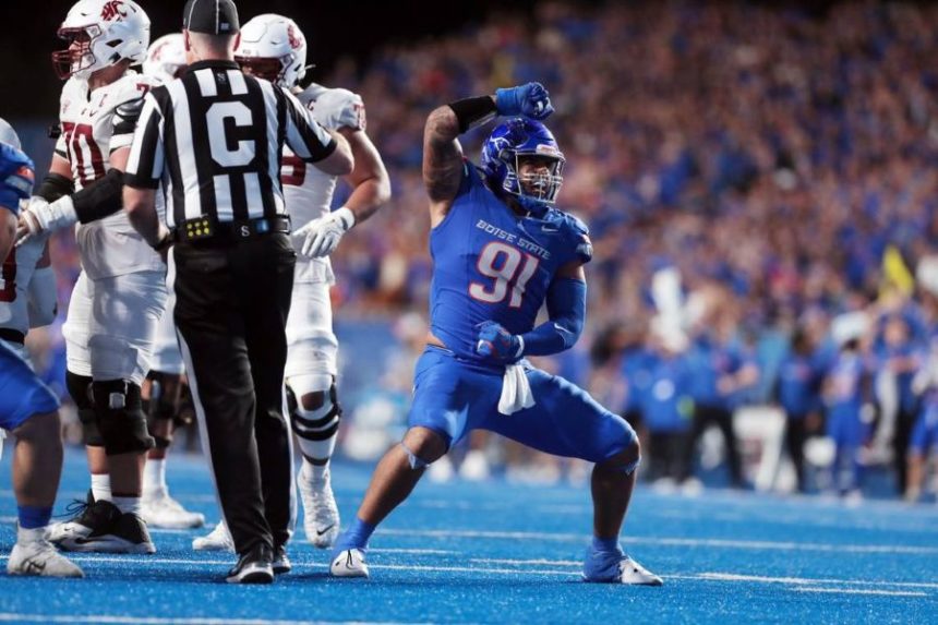 Former Boise State defensive end Ahmed Hassanein celebrates a late stop against Washington State in September 2024. Kyle Green For the Idaho Statesman