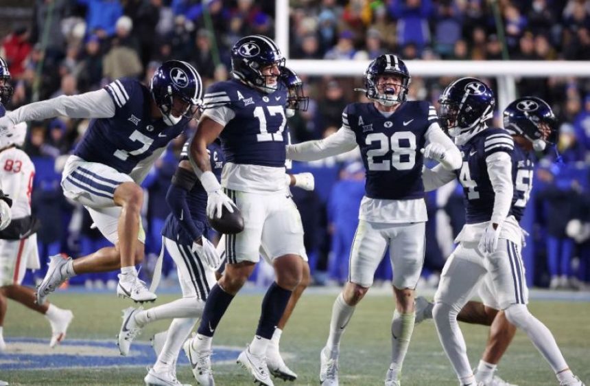 Brigham Young linebacker Jack Kelly (17) celebrates his interception against Houston during a game last season. | Jeffrey D. Allred, Deseret News.