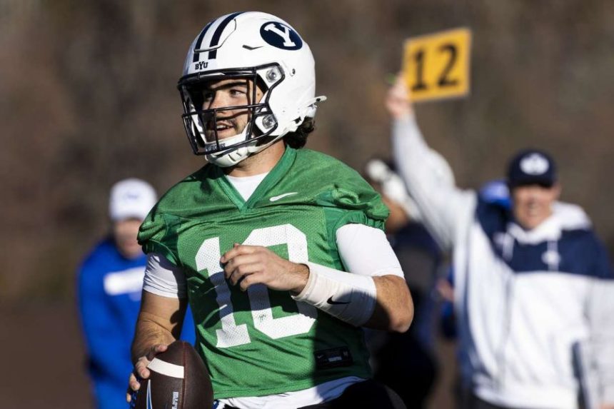 BYU quarterback Treyson Bourguet (10) runs the ball during the opening day of BYU football spring camp held at the Zions Bank Practice Fields of the Student Athlete Building on the campus of Brigham Young University in Provo on Thursday, Feb. 27, 2025. (Photo: Isaac Hale, Deseret News)