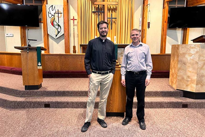 Robert Carabotta, right, next to Pastor Garen Pay inside the sanctuary at Hope Lutheran Church in Idaho Falls. Carabotta is the new headmaster at the school. | Rett Nelson, EastIdahoNews.com