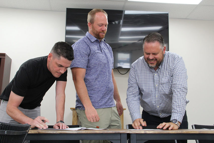 housing project signing photo