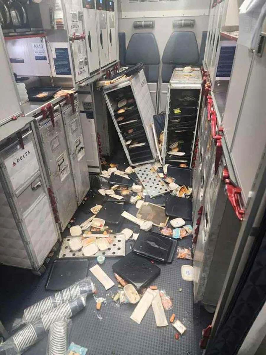 Plane service carts and food items were thrown about in Delta turbulence.| Plane service carts and food items were thrown about in Delta turbulence. | CNN and KSTU 