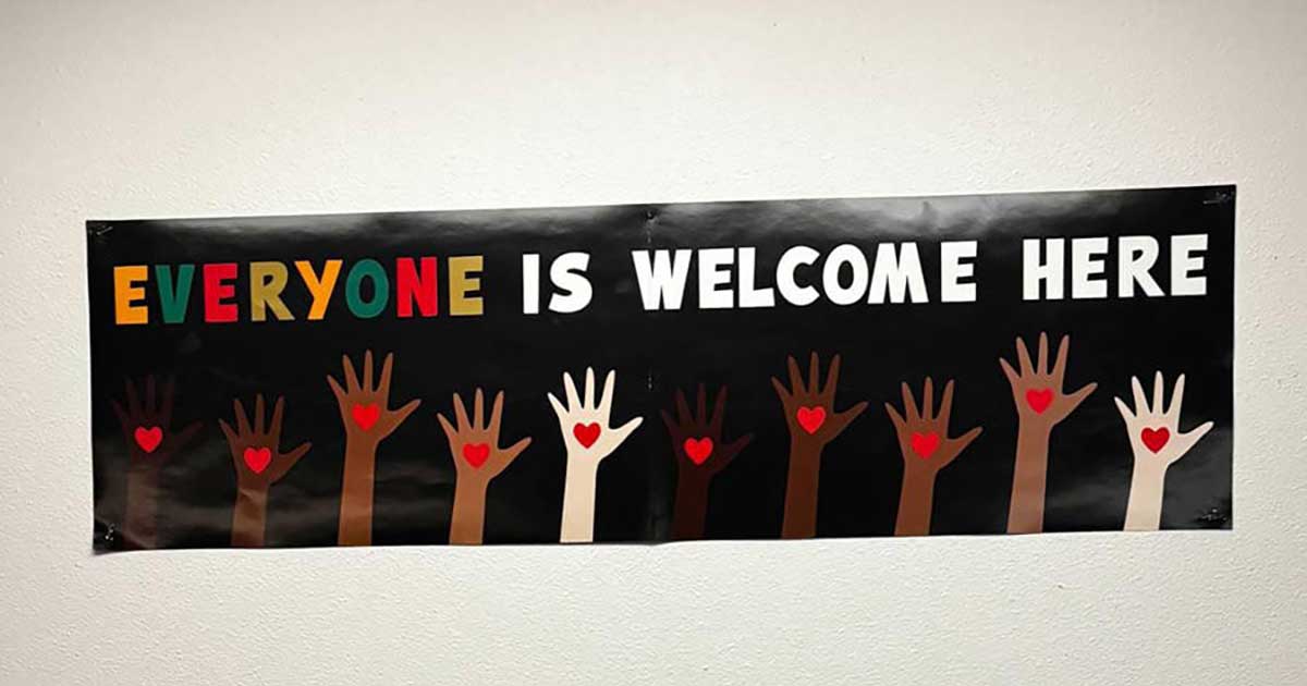 "Everyone Is Welcome Here" sign