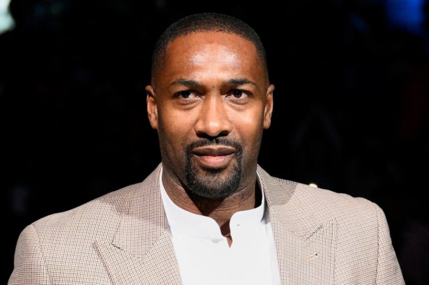 FILE - Former Washington Wizards player Gilbert Arenas takes part in a ceremony during the half-time of an NBA basketball game between the Wizards and the Miami Heat, Friday, Nov. 18, 2022, in Washington. (AP Photo/Nick Wass, File)