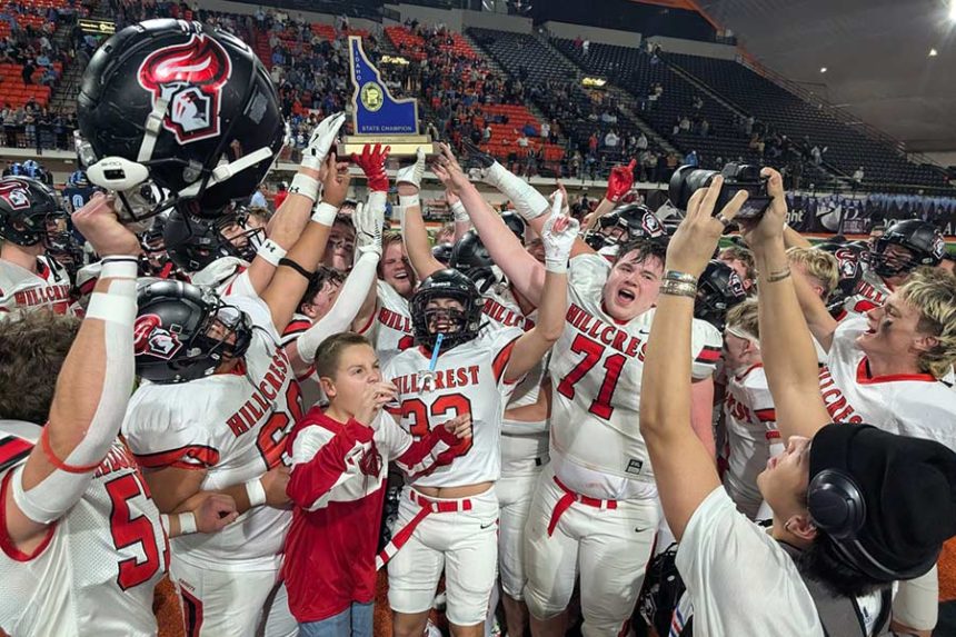 Hillcrest High School football players celebrate their 5A State Football Championship Friday night at Idaho State University’s ICCU Dome. | Kalama Hines, EastIdahoNews.com