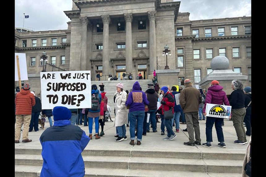 Advocates for Idaho Medicaid and people with disabilities rally against proposed federal Medicaid cuts in front of the Idaho State Capitol on Thursday, March 20, 2025. (Kyle Pfannenstiel/Idaho Capital Sun)