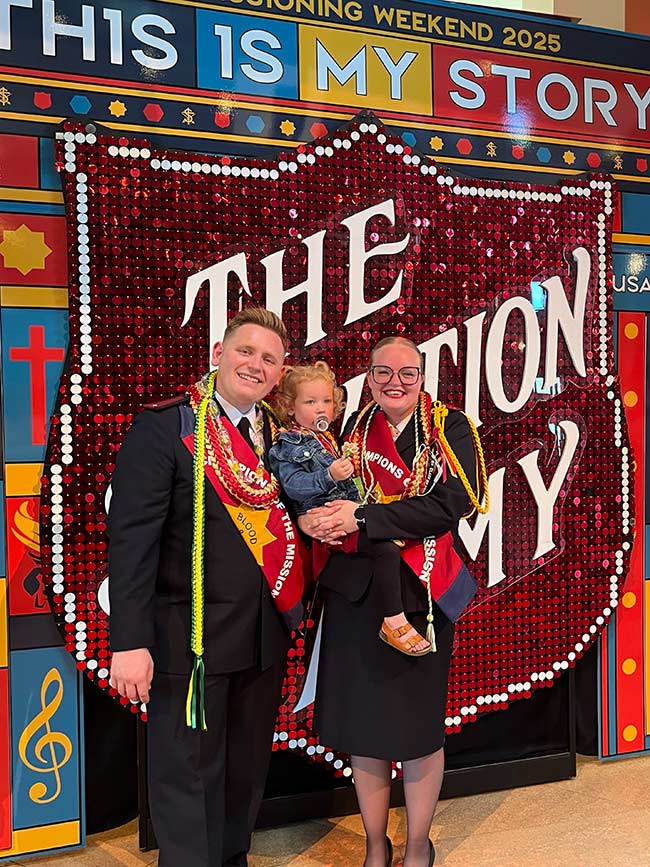 Jon-Marc Lamb, left, with his wife, Brianna, and child. | Courtesy photo