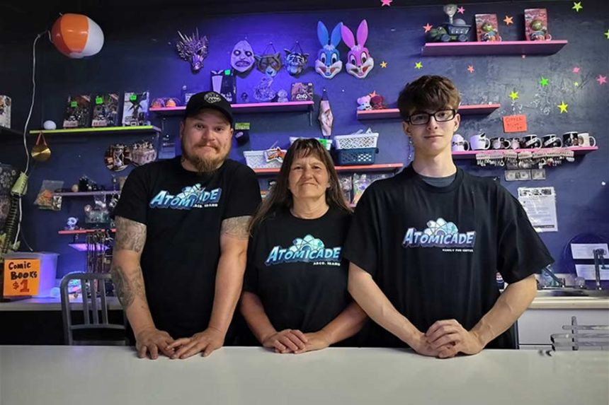 Lisa Lawson, center, owns Atomicade Family Fun Center with her sons, Anthony Walsh, left, and Freedom Smith | Courtesy Lisa Lawson