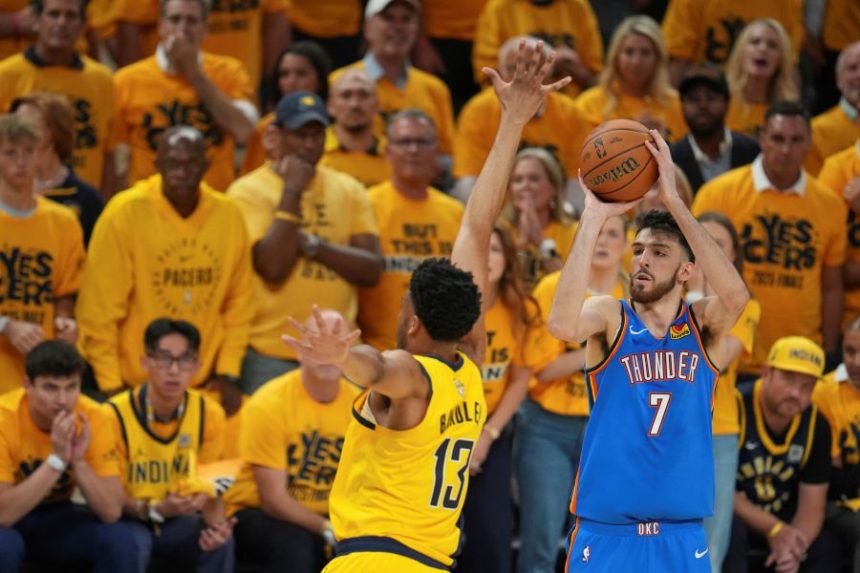 Oklahoma City Thunder forward Chet Holmgren (7) shoots over Indiana Pacers center Tony Bradley (13) during the first half of Game 6 of the NBA Finals basketball series, Thursday, June 19, 2025, in Indianapolis. (AP Photo/Michael Conroy)